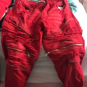Zip up red rip up Jeans